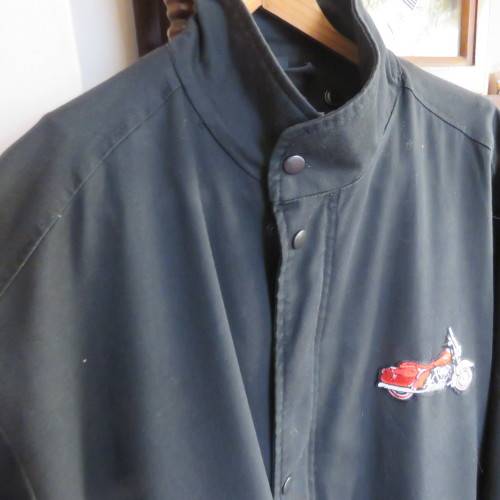 Black parka jacket in heavy cotton fully lined by CARTER HARRIS. Size XXL.Large pockets.Zipped front