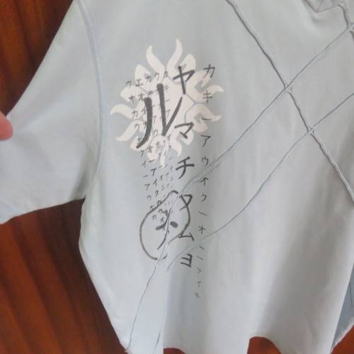Men`s light blue V neck T Shirt with stitched blocks and black/white logo.Size XXL by F&F in cotton.