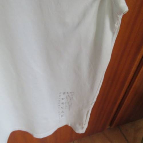 Men`s light blue V neck T Shirt with stitched blocks and black/white logo.Size XXL by F&F in cotton.