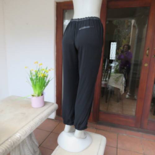 Unique soft polyester pants with elasticated waist/leg cuffs and drawstring. Side pockets.Size 40