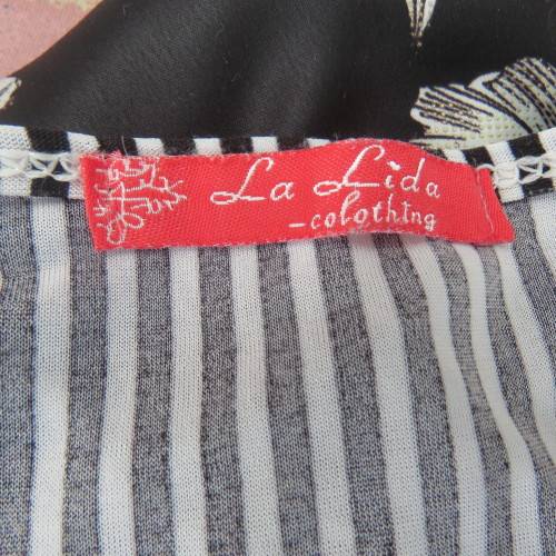 Silky long black/white vertical stretch sexy sleeveless top. Size 38 by LA LIDA. Unique front inlays