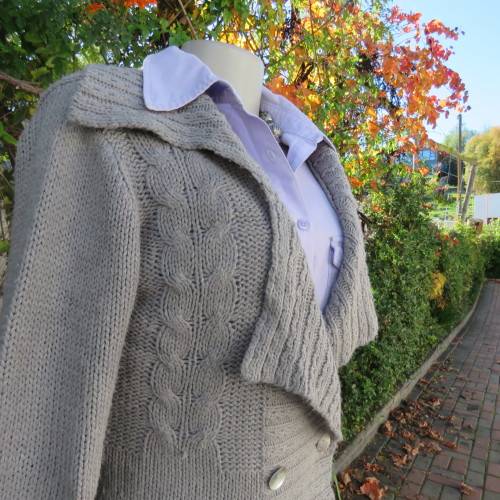 Soft pewter grey 100% acrylic knit long double breast cardigan with unique collar. Size 36 .Good con