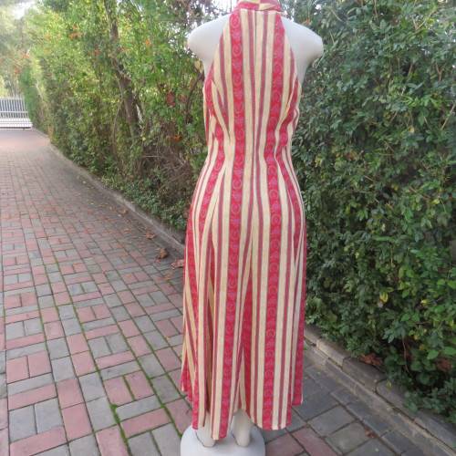 Gorgeous ankle length button down dress in cream/red patterned vertical stripes.Size 36 from Japan.