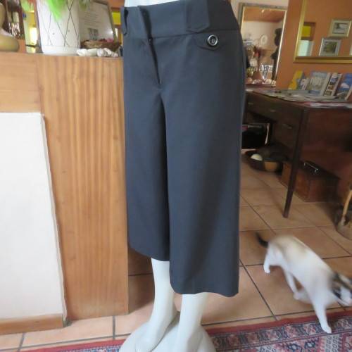 As new black stretch polyester culotte pants size 36/12 by CONNECTION. Dummy pockets. Belt loops