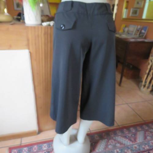 As new black stretch polyester culotte pants size 36/12 by CONNECTION. Dummy pockets. Belt loops