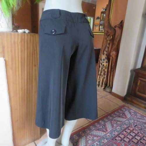 As new black stretch polyester culotte pants size 36/12 by CONNECTION. Dummy pockets. Belt loops