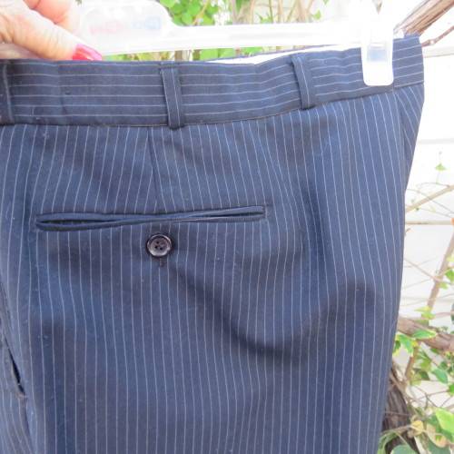 Men`s very dark navy/thin grey stripes 2 pc trevira with 45% new wool suit. Jacket 42R. Pants 40.