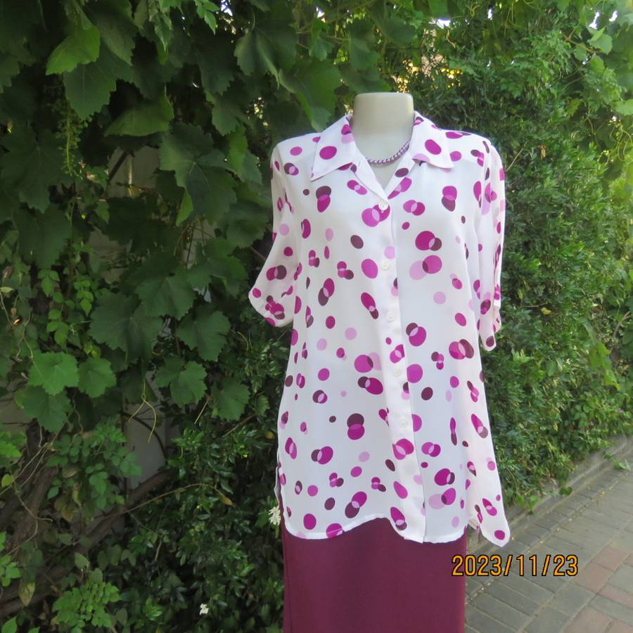 Notice me white sheer polyester short sleeve top with purple dots. Size 42/18.Button down. As new.