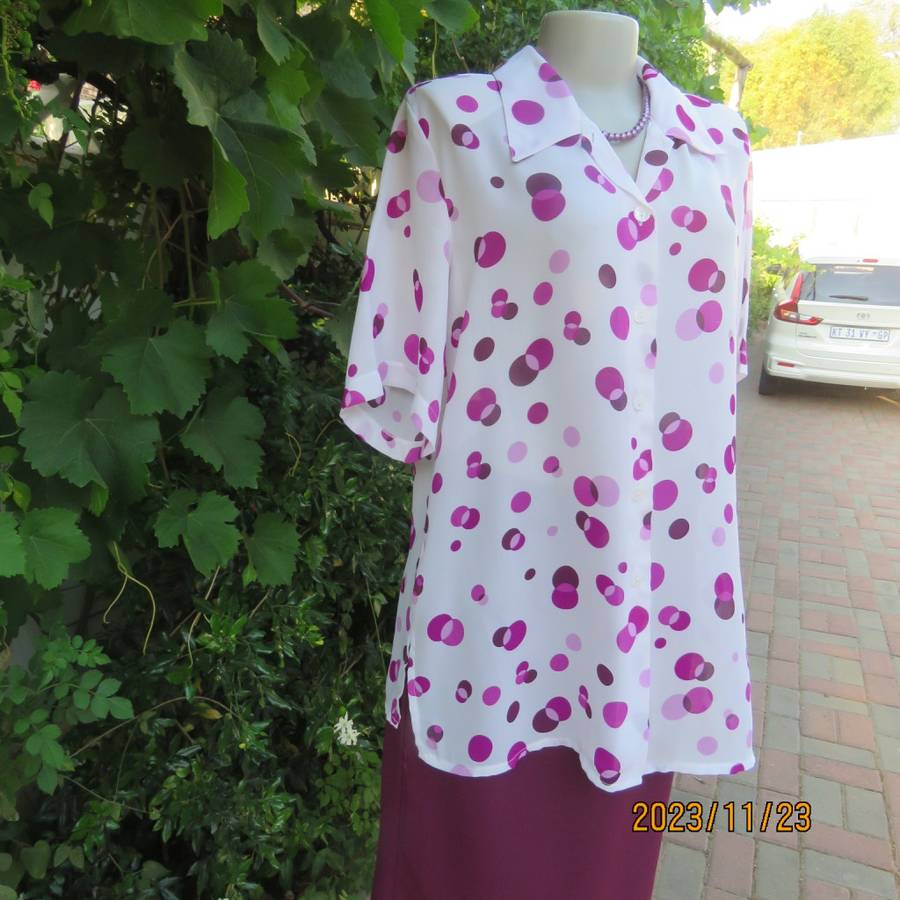 Notice me white sheer polyester short sleeve top with purple dots. Size 42/18.Button down. As new.