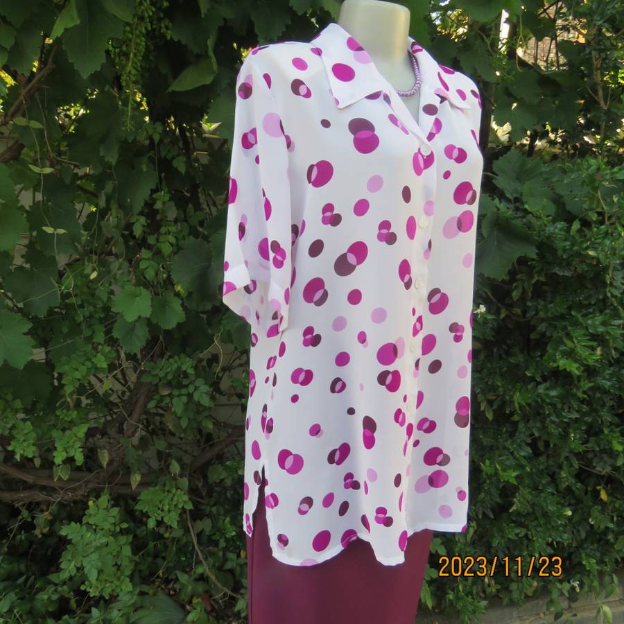 Notice me white sheer polyester short sleeve top with purple dots. Size 42/18.Button down. As new.