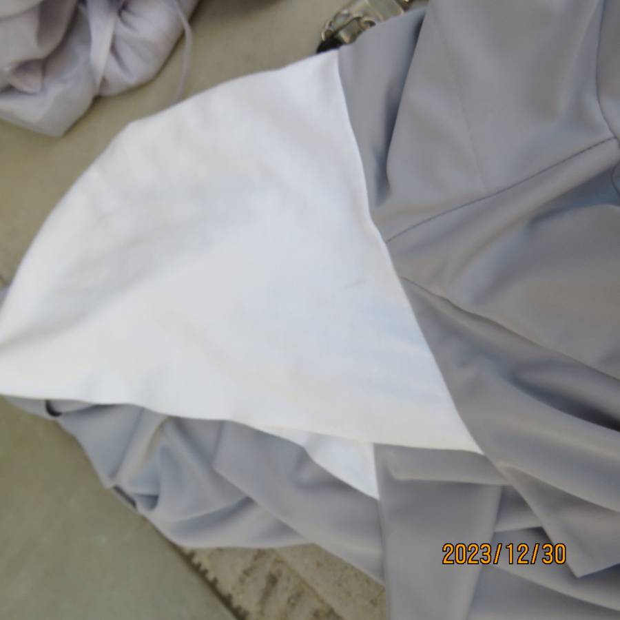 Fashion silver grey open coat in silver grey stretch poly with white hood. By BOU JELOUD size 34.