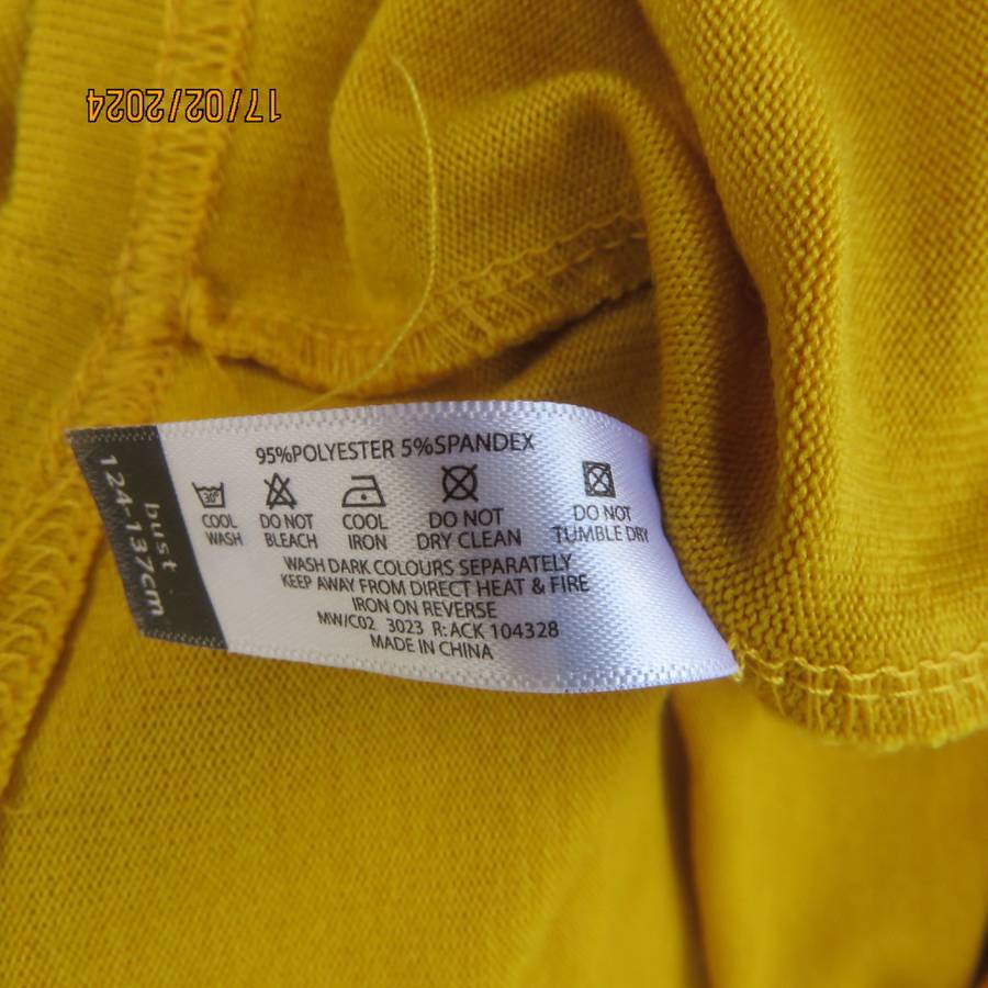 What not to like about this amber yellow warm polyknit top! Dolman sleeves. High cut neckline. 48/50