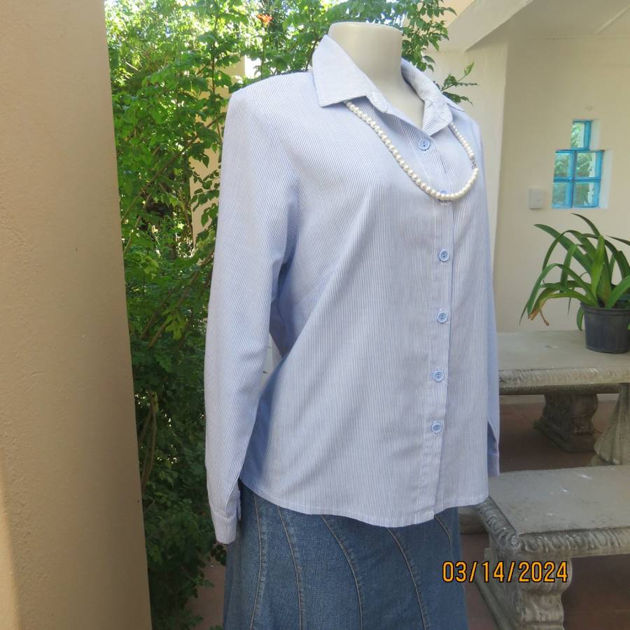Casual long sleeve cotton blue/white striped button down shirt with collar. Size 40. No label.As new