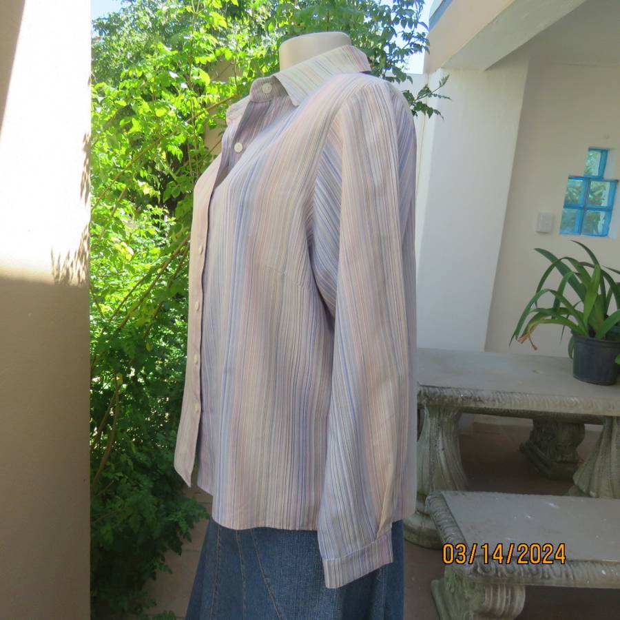 Pretty casual long sleeve shirt in different soft colour vertical stripes. Size 40. Boutique made.