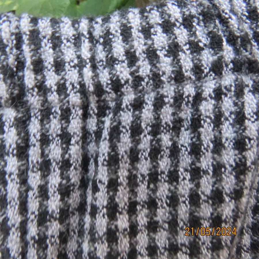 Warm black/grey check pants 70cm inner leg. Elasticated waist. Size 46/22. Owner made.Very good cond