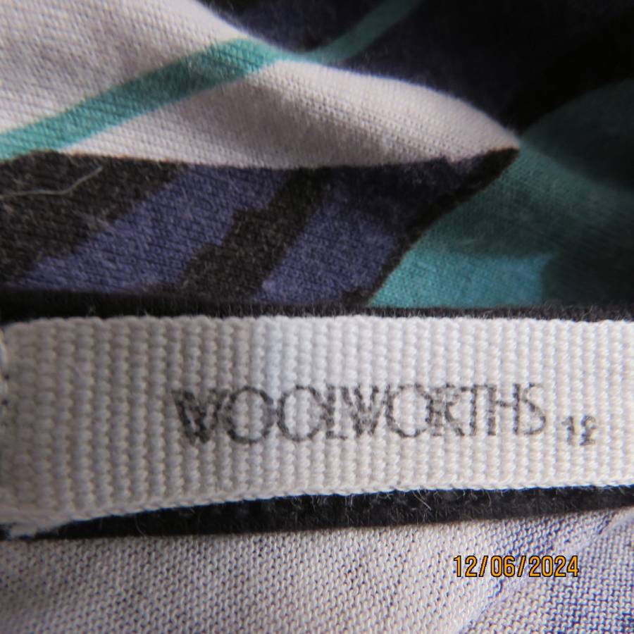 Geometric printed soft viscose stretch empire waist V neck cross over colourful top. WOOLWORTHS 38