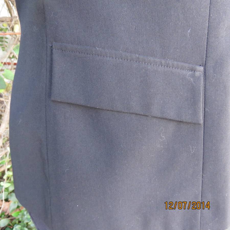 Elegant black sleeveless lined jacket.Three button closure/open collar. Size 38 by OASIS. New cond