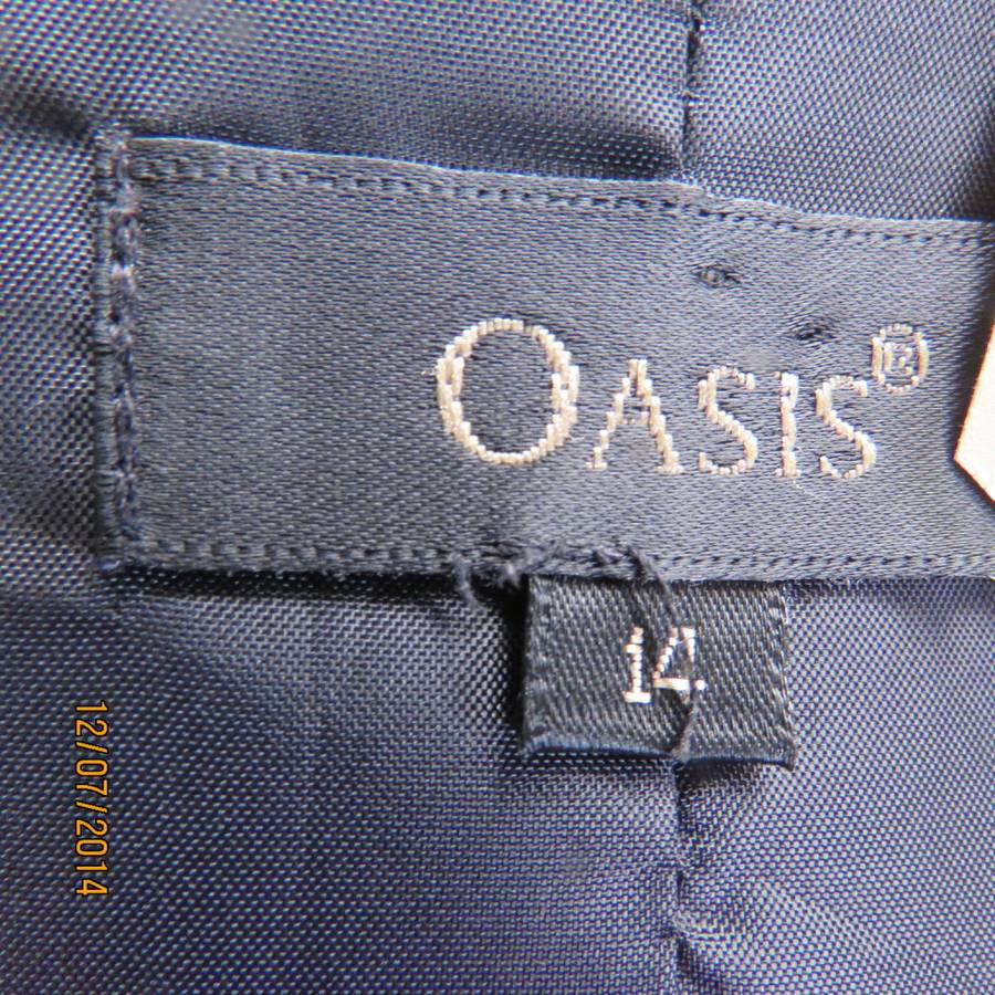 Elegant black sleeveless lined jacket.Three button closure/open collar. Size 38 by OASIS. New cond
