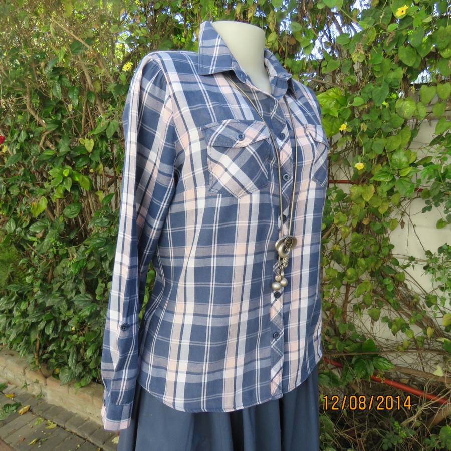 Casual long sleeve check button down top in blues.Peach touches. Two pockets.By IDENTITY.Size 36.