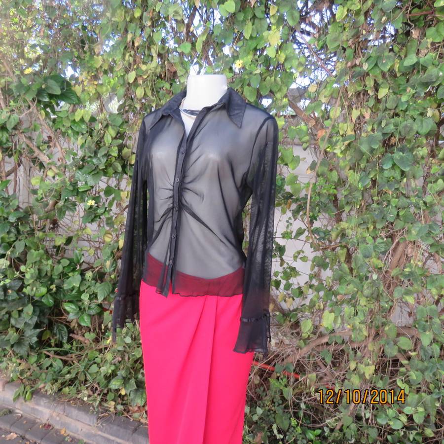 Chic black sheer polyester button down top/open collar. Pretty flare cuffs on sleeves.Size 36.As new
