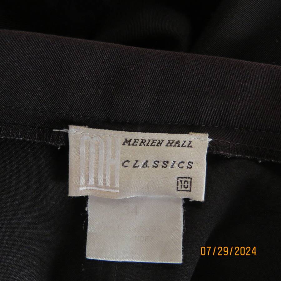 Black silky,shiny stretch polyester ankle length pants by MERIEN HALL size 35. Very good condition