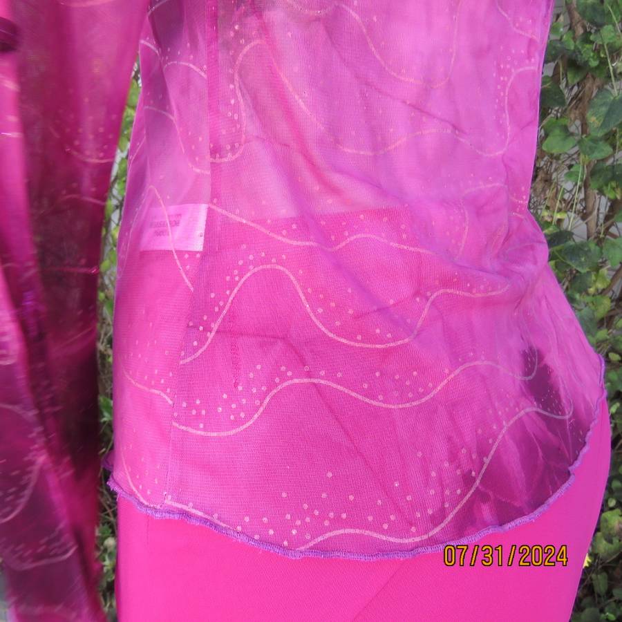 Sexy sheer stretch polyester slip over size 32 top in magenta pinks.Front peephole. As new.