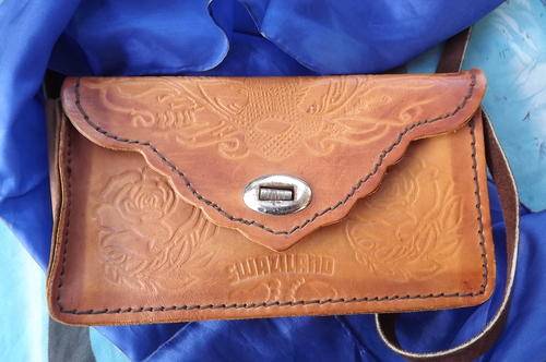 Small Genuine Leather Sling Bag with Craftwork - made in Swaziland - very good condition - 12x21cm