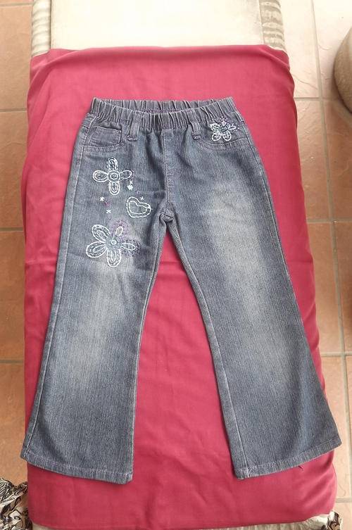 Jeans for 2 to 3 year old girl with embroidery on front by Friends Inc. very good condition