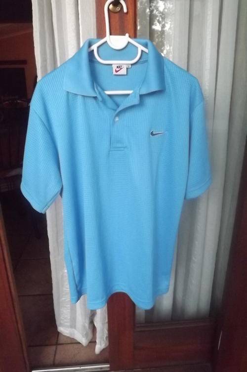 Sky Blue Men's Nike Golf Shirt in 100% Stretch Cotton in size Medium - as new condition
