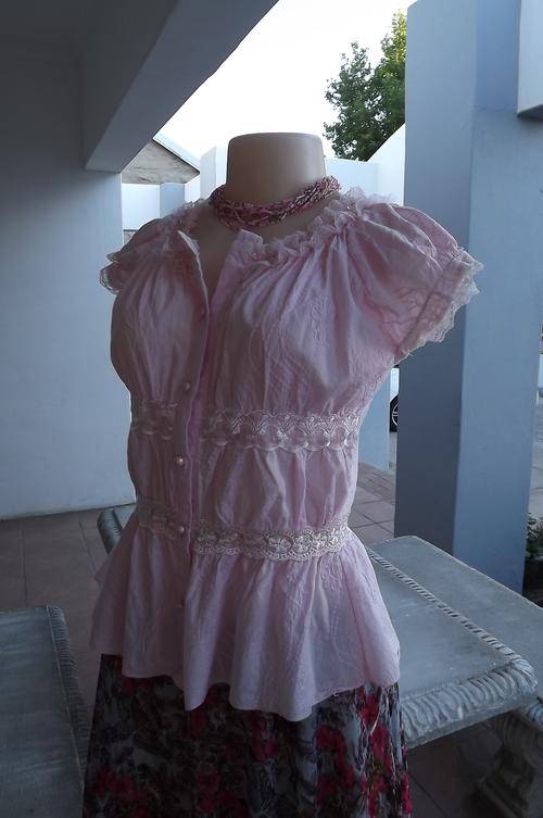 Soft pink feminine blouse with elasticated neckline and sleeves.Size 33/9 by B.N.E.Good condition