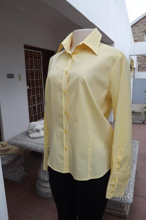 Beautiful tailored buttercup colour Woolworths ladies shirt.Size 38/14.Button down front.Wide cuffs.