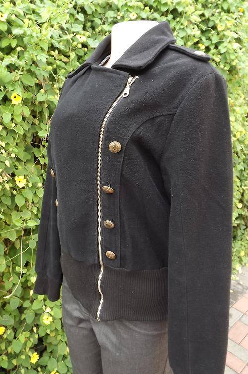 Black heavy brushed polyester lined jacket with zip-up front in size 40-42.Wide knitted ribbing and