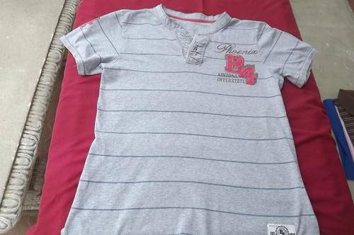 Grey t-shirt with blue stripe by Woolworths in 100% cotton for 13-14 year old boy.Was some boys fav