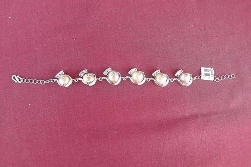 Beautiful rodium plated bracelet with caramel colour freshwater pearls