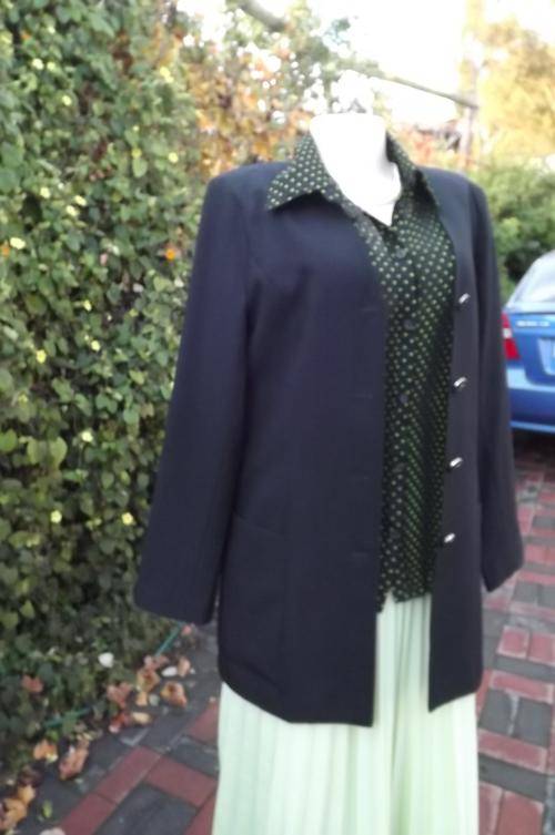 Long black tailored collarless jacket beautifully styled by Daytimers size 32/8.The office to dinner