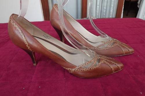 Pair of tan high heel leather shoes from Woolworths made in Vietnam size 7.Used but in very good con