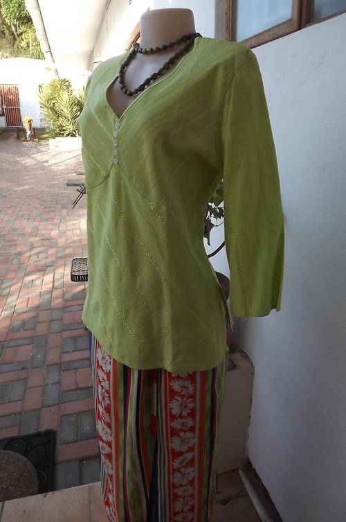 Cheerful lime green polycotton textured fabric top in size 40/16.Small buttons on bust front.V neck.