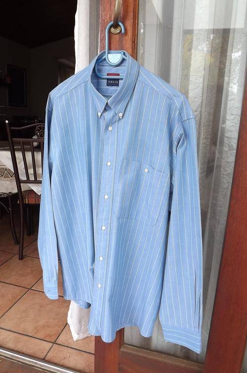 Skyblue and white striped long sleeve shirt by Celio in size Large.Used but still in fine condition