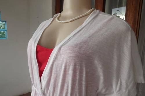 White Old Khaki top, size 36/12 with very low V. Elasticated under bustline. Short cut on sleeves.