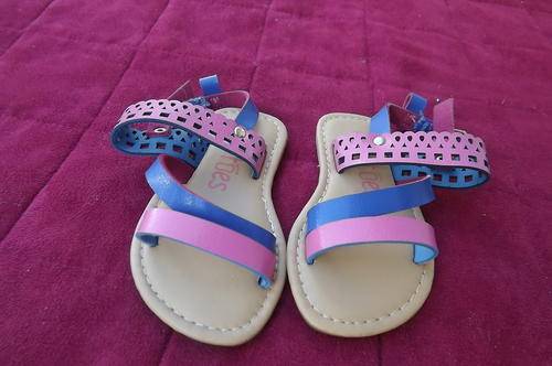 Cute pair of sandals for small girl size 2 by Tiptoes. In pink and blue with ankle straps. New cond.