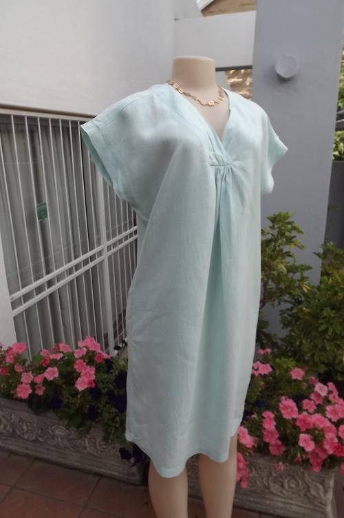 Light turquoise maternity dress in size 38 /14 by Ltd. Women. In 100% linen fabric. As new