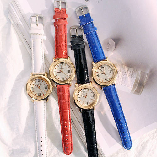 Inset Crystals quartz gold watch ..