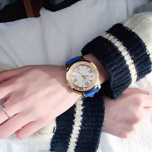 Inset Crystals quartz gold watch ..