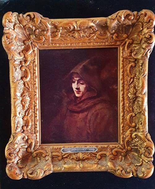 ANTIQUE PRINT OF REMBRANDT IN HEAVY SOLID ORNATE WOOD FRAME.