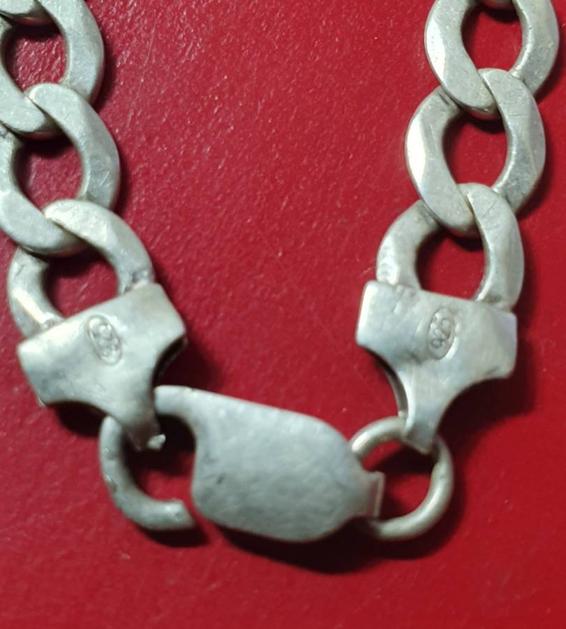 SILVER CHAIN BRACELET . 14.2 GRAMS.