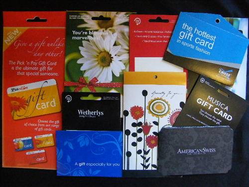 10 Unissued Gift cards or packets - you bid per item to take all - no values loaded - for collectors