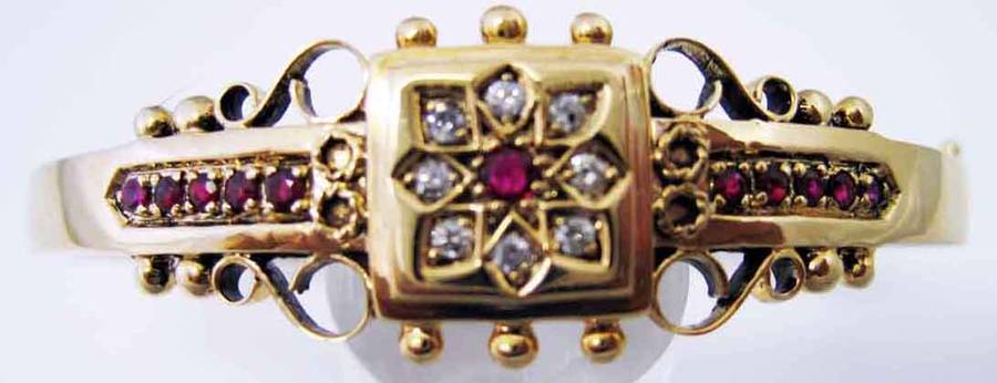 Exqusite Antiq- Style Solid Gold Bangle with Genuine Rubies and Diamonds.