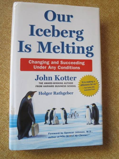 OUR ICEBERG IS MELTING  by John Kotter and Holger Rathgeber  Artwork: Peter Mueller