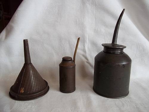 2 Vintage oil cans/ applicators and a funnel for 1 bid