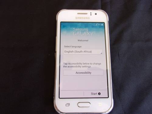 White Samsung Galaxy J1 cell phone - great condition